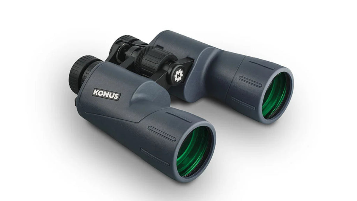 Navy binoculars with green lenses on a white background