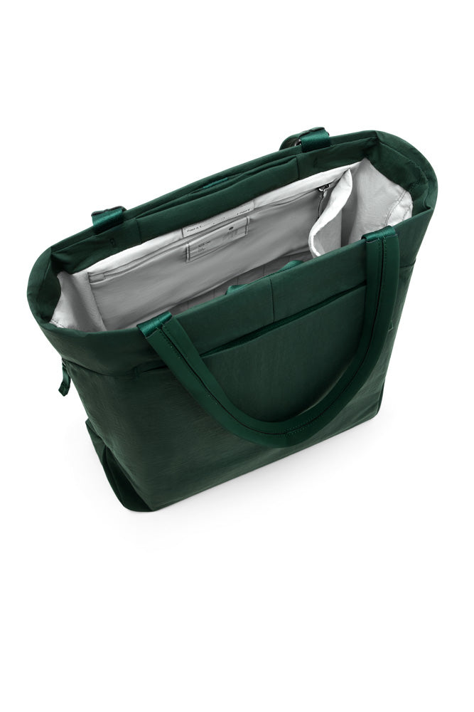 Green bag with a white interior on a white background