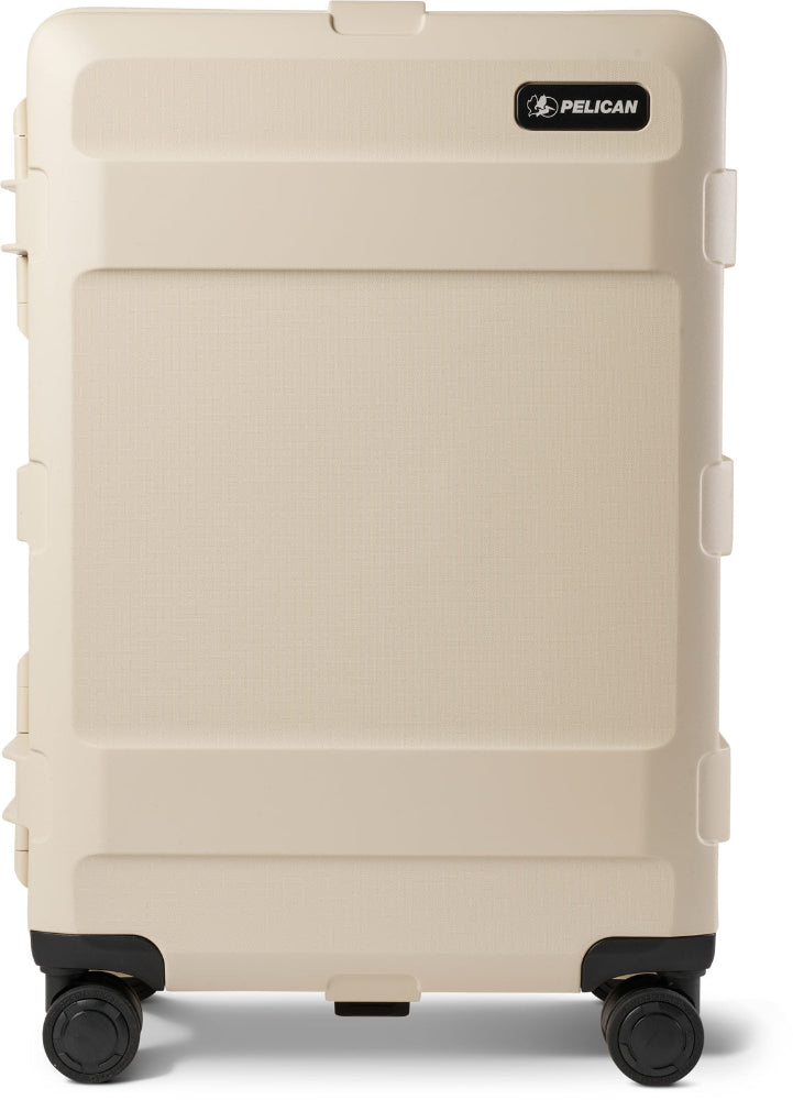 Beige suitcase with black wheels and Pelican logo on a white background
