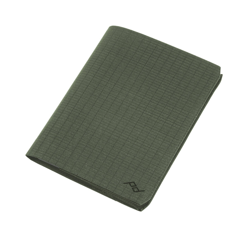 Sage fabric wallet with a peak design logo on a white background