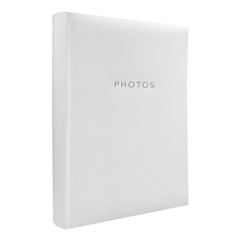 A white hardcover photo album with the word 'PHOTOS' printed in a simple silver font on the front cover, shown against a plain white background.