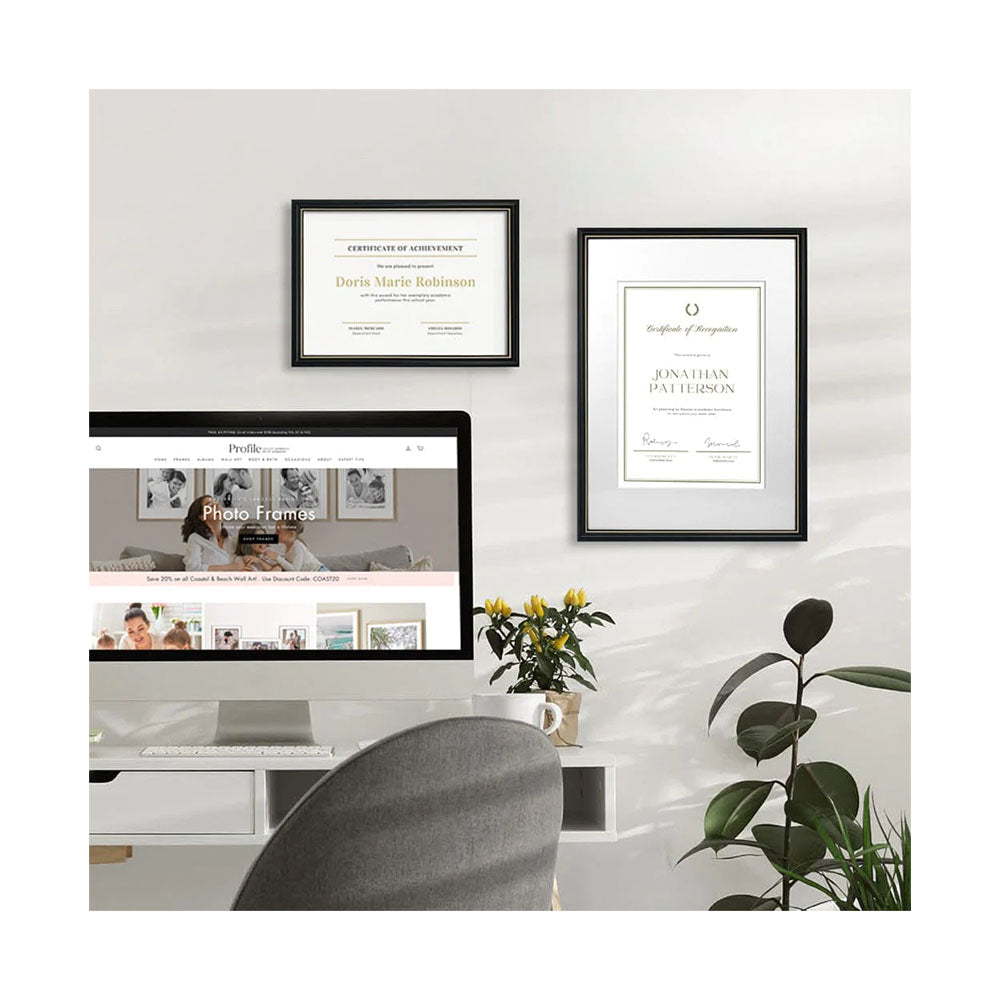 A 15mm (W) x 15mm (D) matt black frame with a gold trim on the inner edge, made in Australia using high-quality eco-sustainable materials, is displayed hanging on a wall.